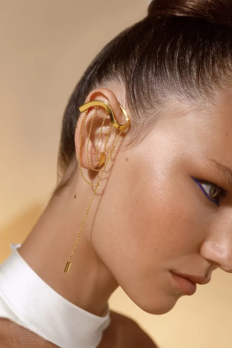 Gold draping ear-cuff with pendant