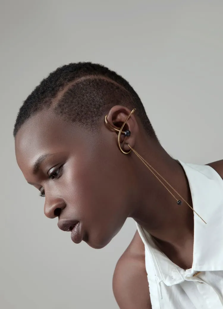 Gold ear-cuff and chain with black pearl