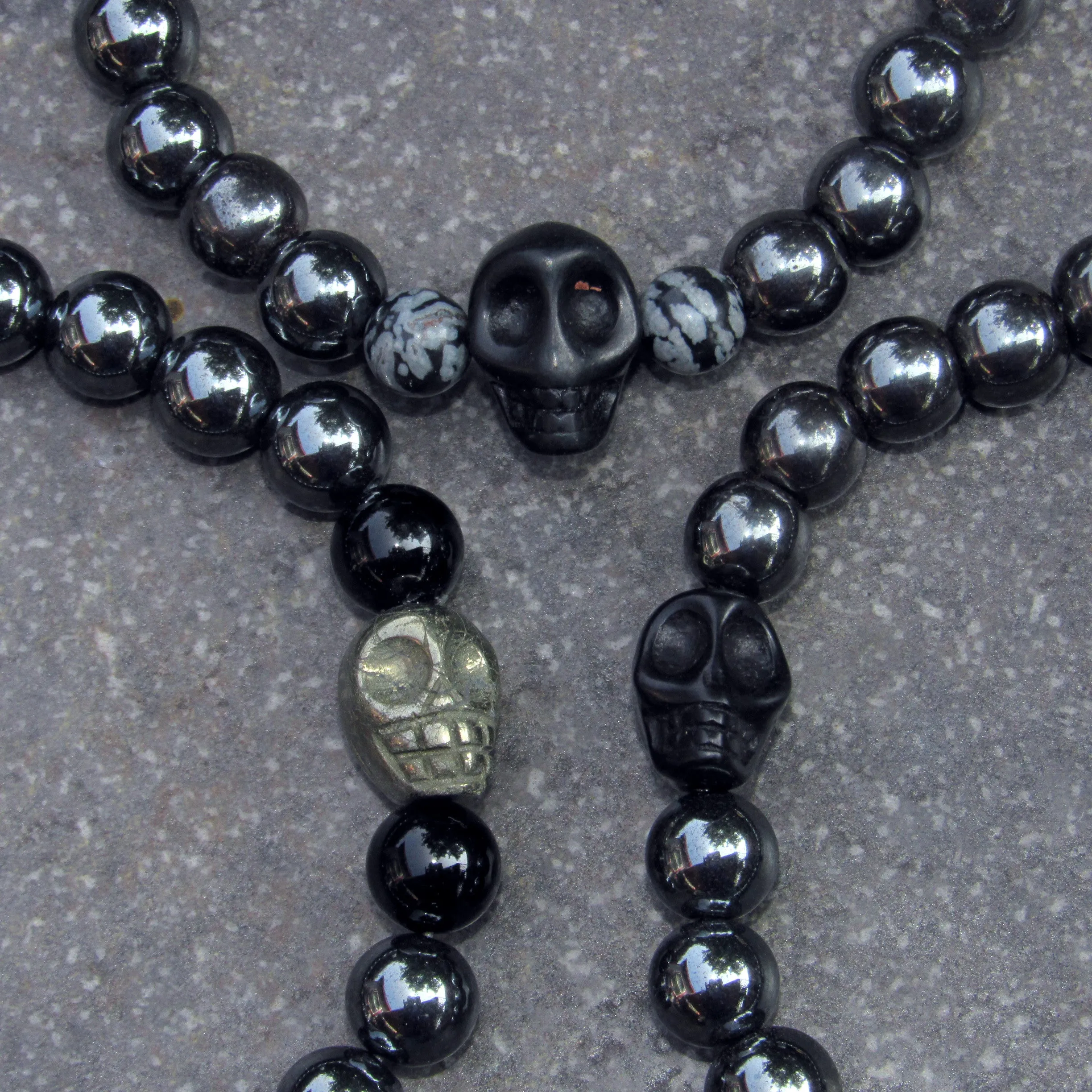 Hematite Gemstone and Skulls bracelet