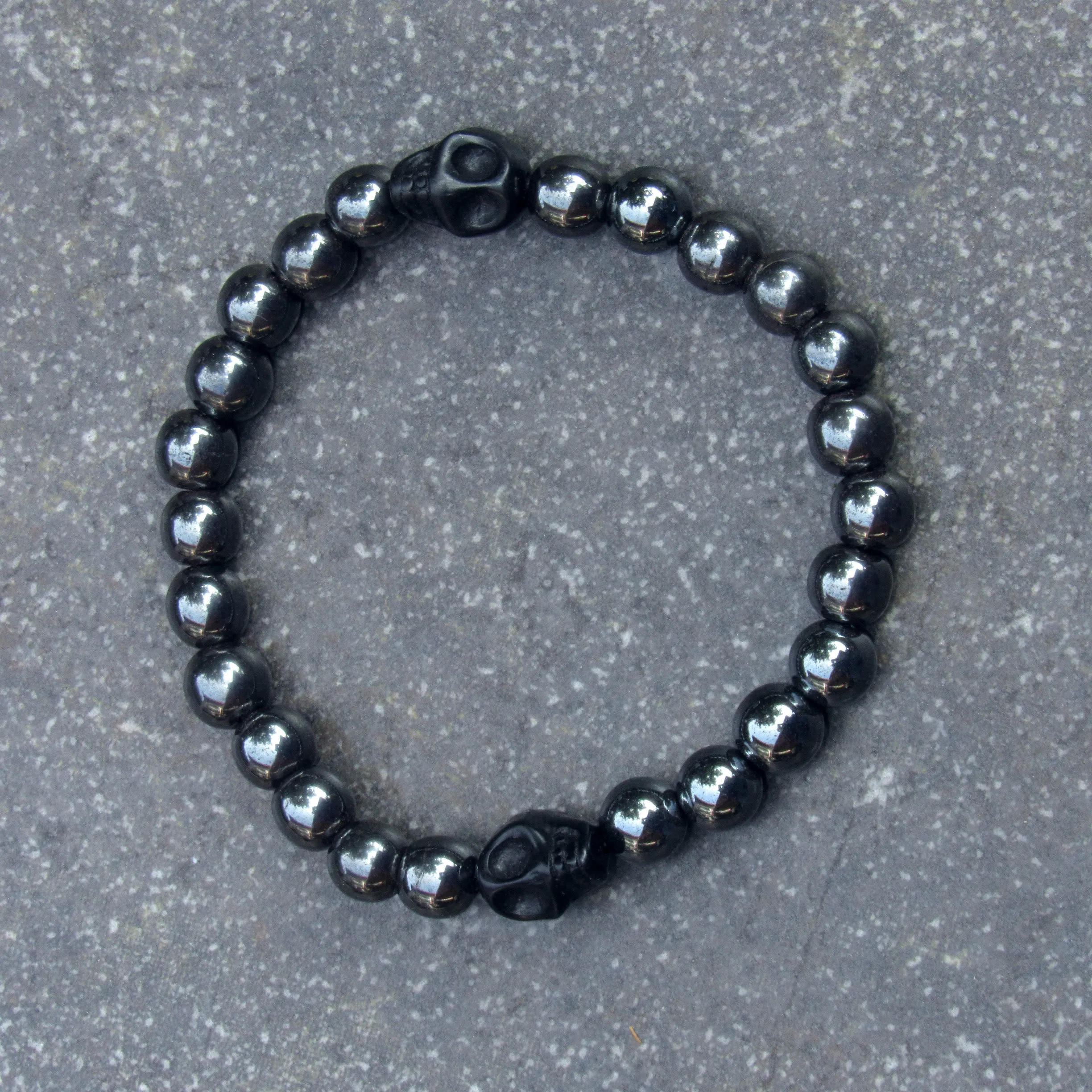 Hematite Gemstone and Skulls bracelet